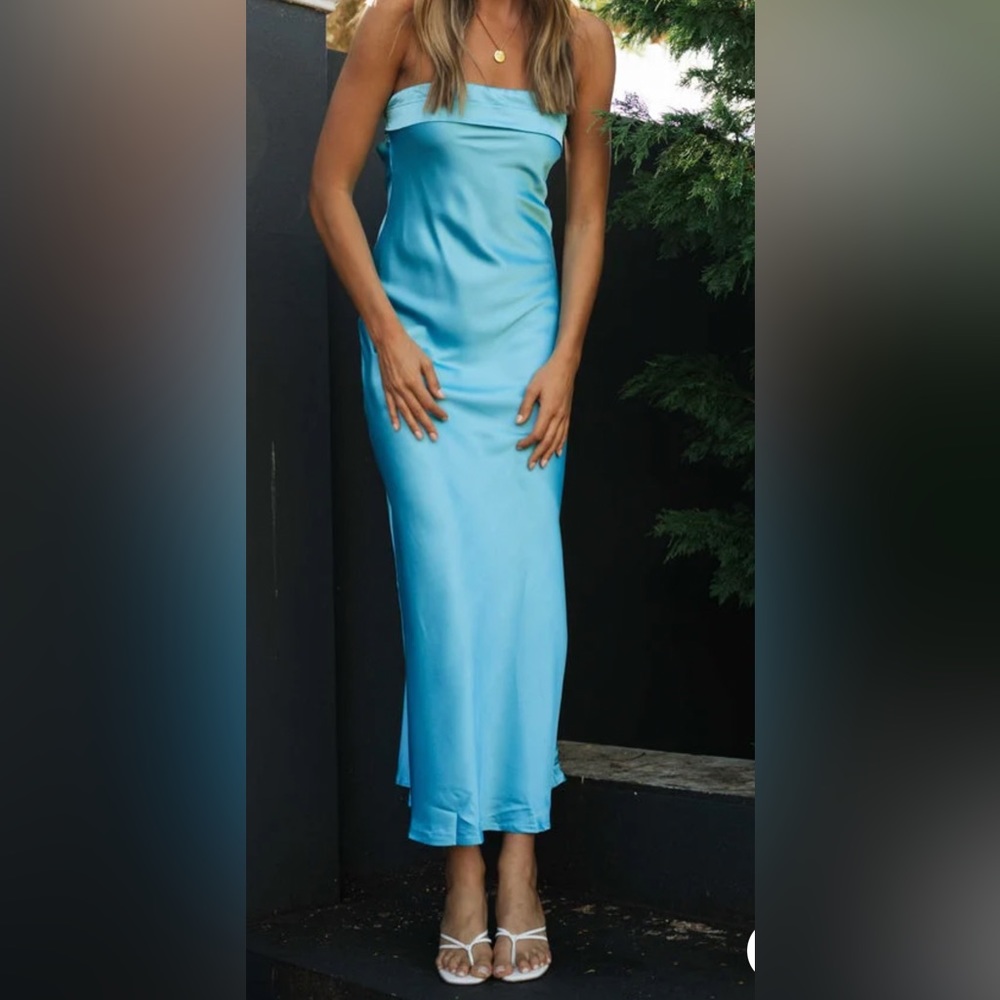 Half open back sleeveless silk maxi dress in blue.
